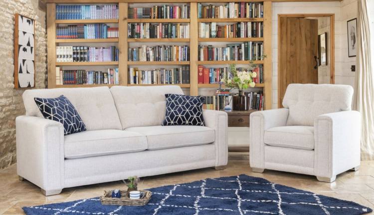 Ella Grand sofa in fabric 1888, large scatter cushions in 1032, chrome feet. Ella Chair in fabric 1888, chrome feet.