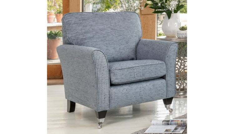 Chair pictured in 2242 (8), (price band E)  fabric with C6 legs 