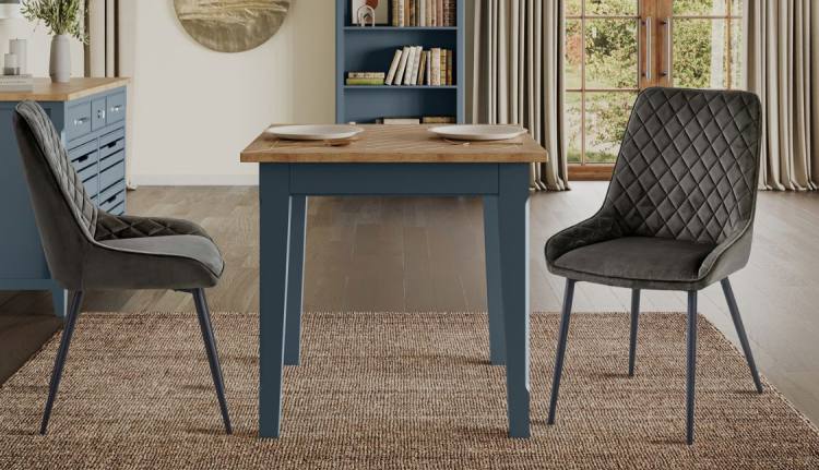 Table shown with gun metal grey colour dining chairs